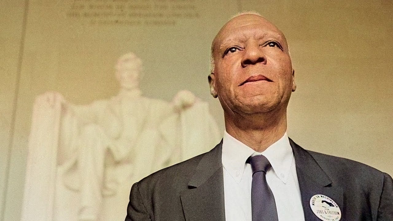 A. Phillip Randolph in front of the Lincoln Memorial