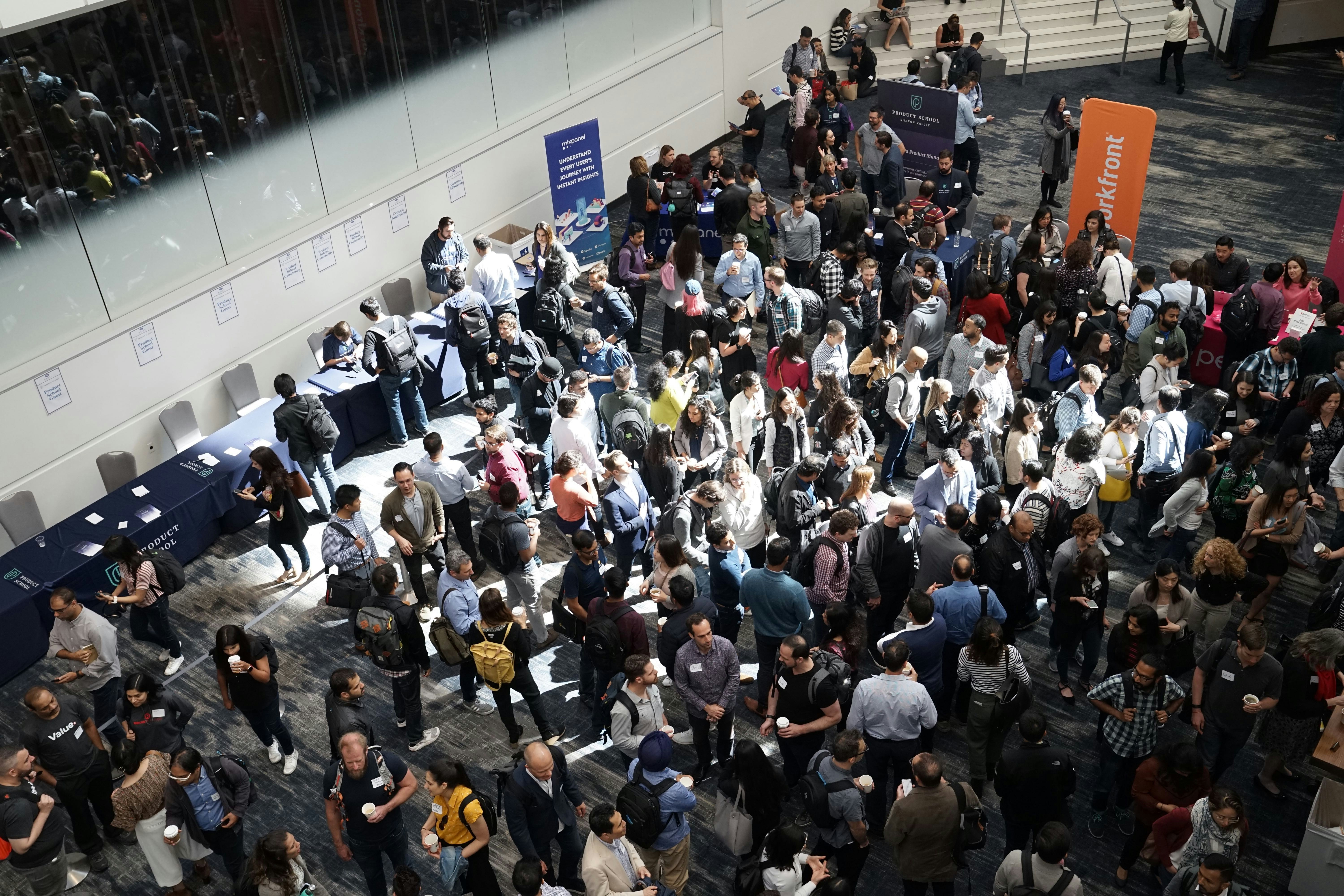 A conference hall full of people